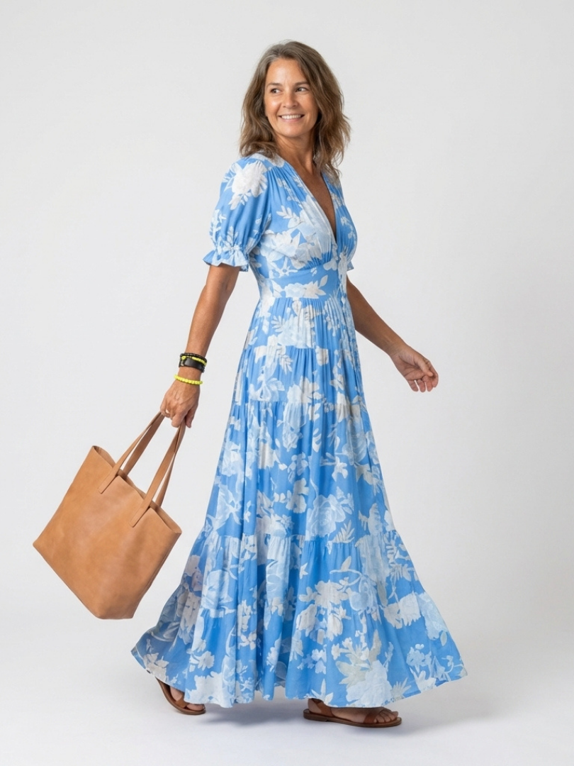 Ione | Robe midi à fleurs sans manches avec décolleté en V